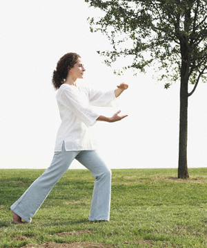 Woman practicing tai chi